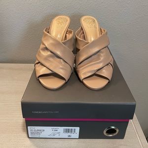 Vince Camuto Clarstie mules in nude color.